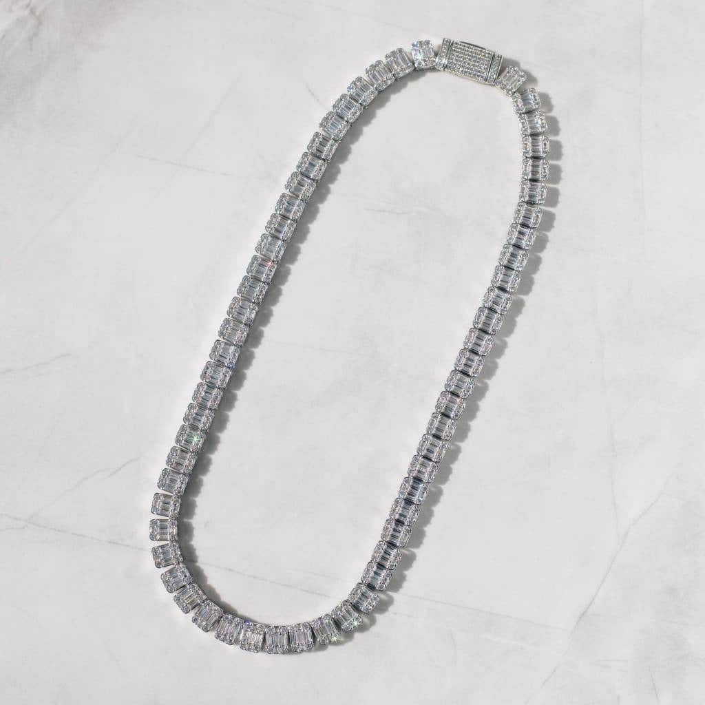 Iced baguette cut tennis chain bracelet in white gold